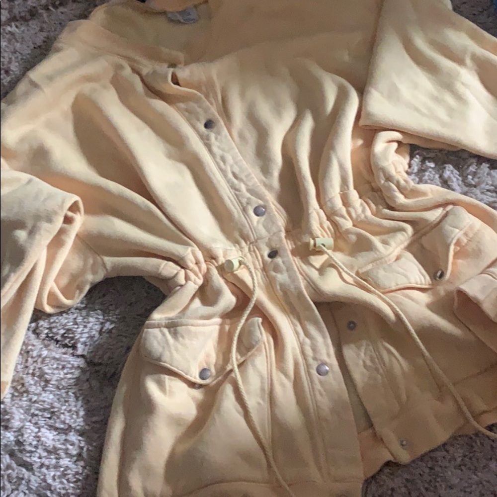 Yellow jacket with buttons